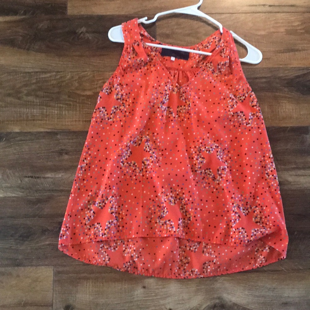Orange sleeveless top